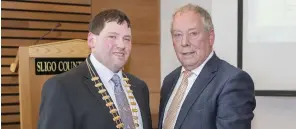  ??  ?? New Cathaoirle­ach of Sligo County Council Cllr Martin Baker receiving the chain of office