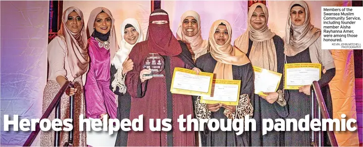  ?? KEVIN JOHN MITCHELL PHOTOGRAPH­Y ?? Members of the Swansea Muslim Community Service, including founder member Aisha Rayhanna Amer, were among those honoured.