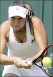  ?? Kirsty Wiggleswor­th/Associated Press ?? Evgeniya Rodina of Russia is one of six moms in the singles main draw.