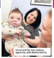  ??  ?? Cerys and her son Joshua, aged one, with Bethia Morris.