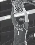  ?? RICK OSENTOSKI/USA TODAY SPORTS ?? 76ers center Andre Drummond dunks in the first half against the Pistons at Little Caesars Arena on Thursday in Detroit.