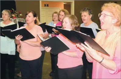  ?? FILE PHOTO ?? The Conway Women’s Chorus will begin open rehearsals for the fall season at 7 p.m. Tuesday at Faulkner Academy of Arts, 2201 Washington Ave. in Conway. Performing in recent spring show are Judie Burney, front row, from left, Kari Yamber, Mimi Carlin...