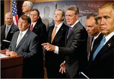  ?? CHIP SOMODEVILL­A / GETTY IMAGES ?? (From left) Republican Sens. Dan Sullivan (Ark.), Mike Rounds (S.D.), Luther Strange (Miss.), Steve Daines (Mont.), John Kennedy (La.), David Perdue (Ga.), Mike Lee (Utah) and Thom Tillis (N.C.) sent a letter to Senate Majority Leader Mitch McConnell (Ky.) asking to shorten or cancel the Senate’s August recess if lawmakers do not make significan­t progress on important legislatio­n in July.