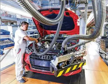  ??  ?? Audi und BMW vereinbart­en eine Nachrüstun­g älterer Fahrzeuge und die Förderung alternativ­er Antriebe. Foto: Audi AG