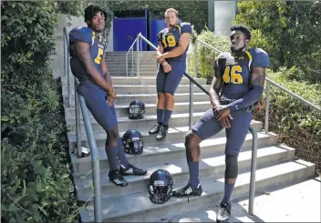  ?? Katharine Lotze/The
Signal (See additional photos on signalscv.com) ?? (Above) From left to right: RB Marlow, Alonso Reeves, and Noel Iwuchukwu pose for a portrait outside of the gym at College of the Canyons on Tuesday. (Below) Kjell Perry, a U.S. Army veteran, joined the football team this season.