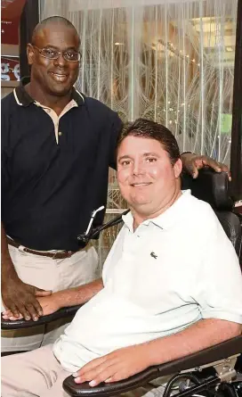  ??  ?? Jacobs (left) was the running back whom Buoniconti tackled during a college football game. The tackle left Buoniconti paralysed from the neck down when he was 19. They are friends today after years of estrangeme­nt.