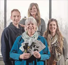  ?? GARY YOKOYAMA THE HAMILTON SPECTATOR ?? Deborah Bowen (holding leaflets) with Redeemer students and staff associated with the poetry project, from left, Noah Van Brenk, Mikaela Van Pelt and Julia DeJong.