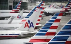  ??  ?? American Airlines slashed its profit forecast largely due to the crisis around the Boeing 737 MAX, a somewhat more profound hit to operations and customer bookings than at other carriers affected by the jet’s grounding. – AFP photos