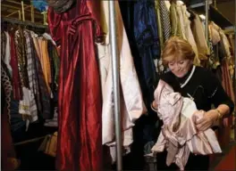  ?? TAIMY ALVAREZ, SUN SENTINEL ?? Marilynn Wick went from real estate to selling and renting costumes to running a theatre. Wick stands in Costume World’s warehouse, the U.S.’s largest collection of Broadway wardrobes.