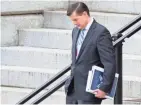  ?? MICHAEL REYNOLDS/EPA-EFE ?? White House staff secretary Rob Porter, who resigned Wednesday, says his ex-wives’ claims of domestic abuse are part of a “smear campaign” against him.