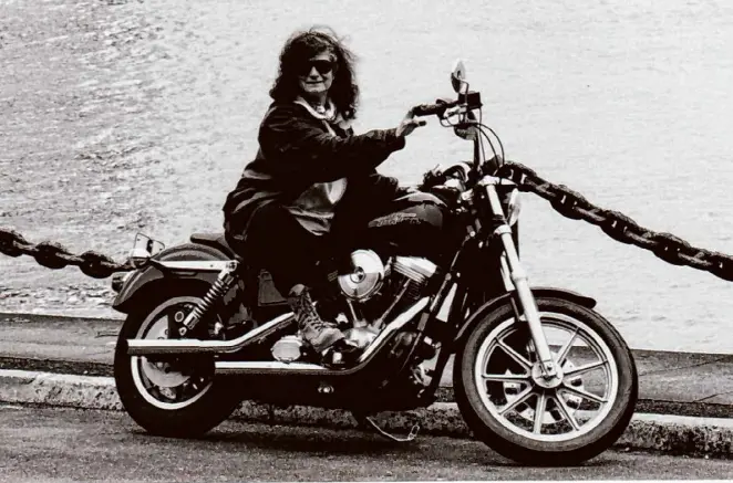  ?? Courtesy of Howard Schwartz ?? Barbara Joans sits aboard her Harley in the Marina District of San Francisco in the 1990s. Her book, “Bike Lust,” came out in 2001, when she was 66.