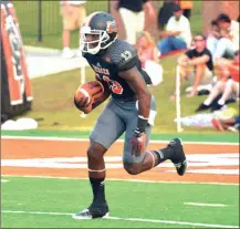  ?? File Photo / Mercer Athletics ?? Mercer’s Chandler Curtis returns a kickoff during a game last season for the Bears.