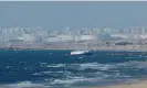  ?? Photograph: Mohammed Salem/Reuters ?? Aid delivered by the Open Arms vessel arrives off the coast of Gaza.