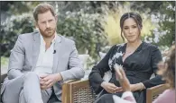  ?? PICTURE: JOE PUGLIESE/AP ?? MIXED VIEWS: Like the rest of the country, our correspond­ents are divided over Harry and Meghan’s interview.