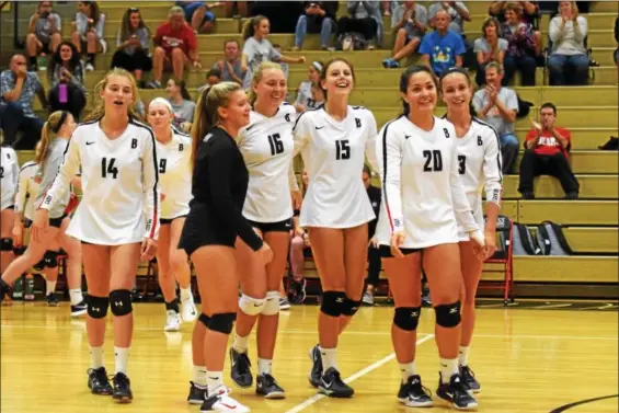  ?? (Thomas Nash Digital First Media) ?? Members of the Boyertown girls volleyball team walk off the court following their 3-0 win over Norristown. It was the Bears’ first varsity win in program history.