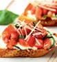  ??  ?? Bruschetta An antipasto of grilled bread topped with ripened tomatoes, fresh basil, garlic, and olive oil. It is a party classic.