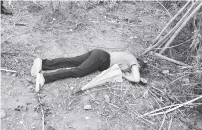  ?? ?? Nursing aide Emelyn Lasa was found dead in a vacant lot in Barangay Bolilao, Mandurriao, Iloilo City on Monday afternoon, Feb. 12. Police said she sustained injury at the back of her neck and was missing some fingers.