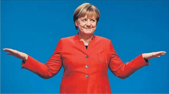  ?? TOBIAS SCHWARZ / AFP ?? Sin rival. Merkel fue elegida presidenta de su partido por novena vez consecutiv­a con el 89,5% de los votos