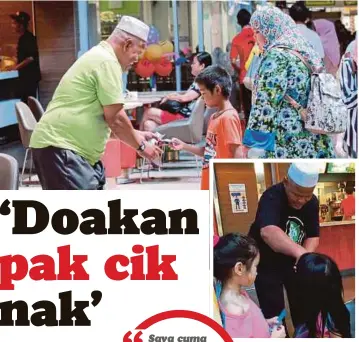  ??  ?? PAK Johan memberi kanak-kanak duit ketika ditemui di Melaka Sentral, Peringgit.