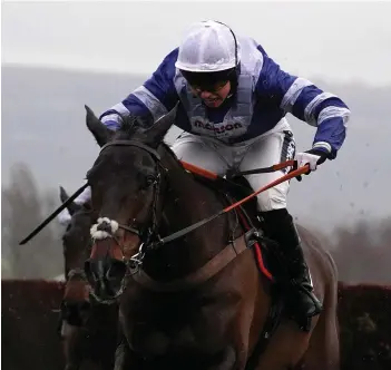  ??  ?? Bryony Frost and Frodon get away from the last fence on the way to winning The Caspian Caviar Gold Cup Handicap Chase at Cheltenham on Saturday