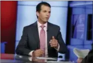  ?? RICHARD DREW — THE ASSOCIATED PRESS ?? Donald Trump Jr. is interviewe­d by host Sean Hannity on the Fox News Channel.