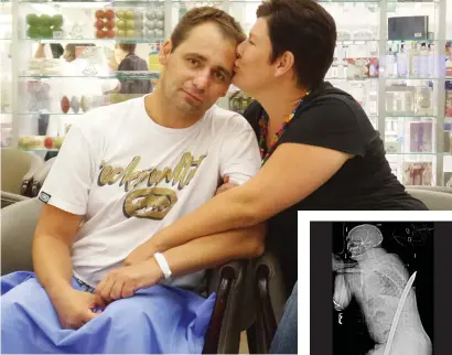  ?? Pictures: Supplied ?? BARMAN. Daniel de Wet and his wife, Lizl, on day 15 of his 19-day recovery at Milpark Hospital. De Wet was impaled by a metal crowbar while working at a Gauteng gold mine. Inset: A Lodox scan image shows how the crowbar penetrated his body through the...