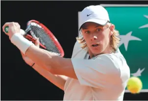  ?? AP PHOTO ?? Denis Shapovalov returns the ball to Rafael Nadal at the Italian Open in Rome last week.