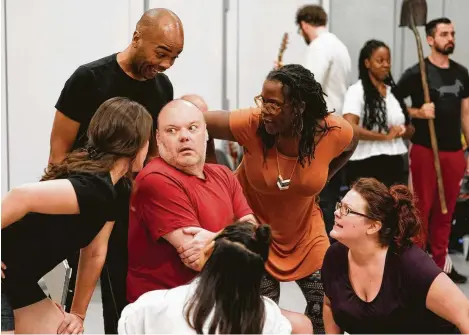  ?? Photos by Melissa Phillip / Staff photograph­er ?? Kyle Sturdivant, center, who starred in the staging of “Speeding Motorcycle” 13 years ago, and others rehearse for its revival.