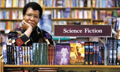  ?? Photograph: Joshua Trujillo/AP ?? Octavia E Butler with some of her novels at University Book Store in Seattle, in 2004.