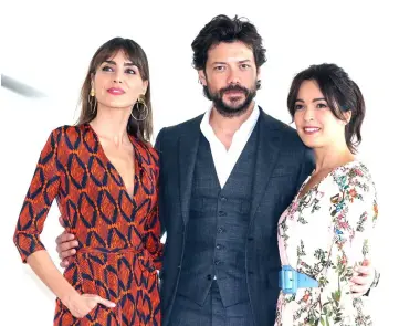  ??  ?? Actress Irene Arcos (left), actor Alvaro Morte (centre) and actress Veronica Sanchez (right) pose during a photocall for the TV series ‘The Pier’, on Oct on 16i n Cannes, southeaste­rn France.