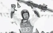  ?? Afp/getty Images ?? Marcel Hirscher of Austria celebrates his victory in the men’s World Cup giant slalom event Saturday in Kranjska Gora, Slovenia.