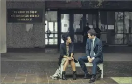  ?? Lara Solanki Netflix ?? “THE LINCOLN LAWYER,” with Jazz Raycole and Manuel Garcia-Rulfo, features scenes shot in downtown Los Angeles and in front of local landmarks.