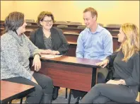  ?? ERIC MCCARTHY/JOURNAL PIONEER ?? Planning the West Prince Chamber of Commerce’s annual general meeting for Feb. 7 are from left, executive director Tammy Rix, board member Paula Foley, president Geoffrey Irving and director Michele Oliver. The meeting will be held at the Holland...