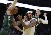  ?? BEN MARGOT — THE ASSOCIATED PRESS ?? The Warriors’ Willie Cauley-Stein, center, was traded to Dallas. Dallas will send Utah’s 2020 second-round pick to the Warriors.