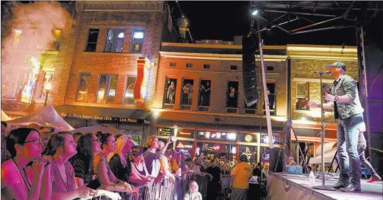  ?? Ben Neely ?? Cole Swindell performs Tuesday at the 57th anniversar­y party for Tootsie’s Orchid Lounge in Nashville, Tenn.