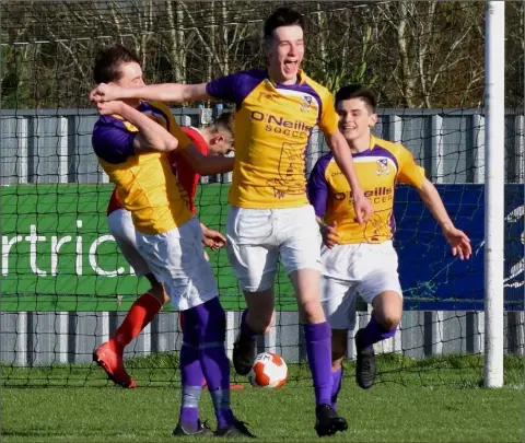  ??  ?? Dylan Fleming celebrates with his Wexford team-mates after scoring a late winner against the Cork Youth League.