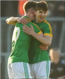  ??  ?? Matthew Costello, left, and Joe Moore celebrate Meath’s victory at the end of the game in Navan.