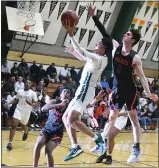  ??  ?? St. PatrickSt. Vincent High’s Jalen Scott elevates to the hoop during Tuesday’s 53-47 win over St. Joe’s in the North Coast Section playoffs.