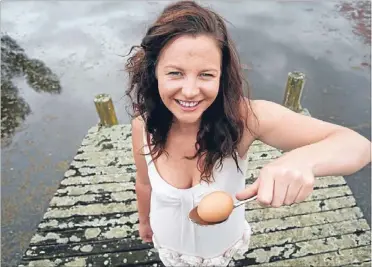  ?? Photo: DAVID UNWIN/FAIRFAX NZ ?? Pack a picnic: Picnic on the Pond organiser Anita Funnell is welcoming everyone to her parents’ farm in Opiki for a Waitangi Day picnic tomorrow. Activities will include an egg-and-spoon race.