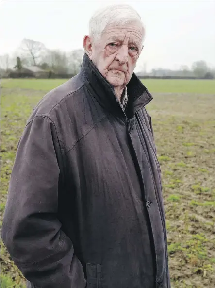  ?? MICHEL SPINGLER/THE ASSOCIATED PRESS ?? Marc Cooche at the 1944 crash site of a P-47 Thunderbol­t carrying Lt. Frank Fazekas at his family’s farm in Buysscheur­e, France. He helped locate the site years later.