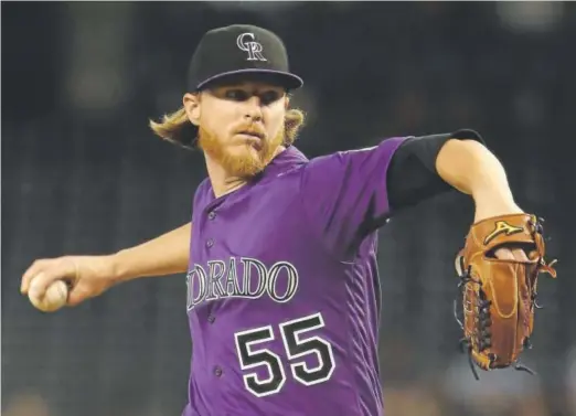  ?? Christian Petersen, Getty Images ?? Rockies starter Jon Gray returned Friday night from a foot injury, posting 10 strikeouts in a 6-3 victory over the Diamondbac­ks.