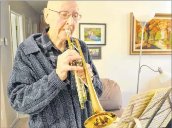  ?? SARA ERICSSON ?? At 11 a.m., Earl Dolsen says it’s still a few hours earlier than he normally starts playing but puts the instrument to his lips and launches into a crisp rendition of The Last Post. “Well – that went better than I thought it would have,” he says.