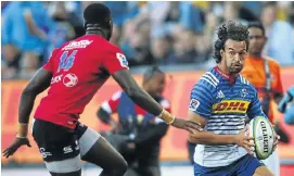  ?? Picture: ESA ALEXANDER ?? CHECK MATE: Stormers wing Dillyn Leyds takes on Lions winger Madosh Tambwe during yesterday’s Super Rugby match at Newlands