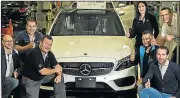  ?? Picture: SUPPLIED ?? SPEEDING AHEAD: Members of the MBSA management team with the first W205 AMG C43 at the East London plant yesterday