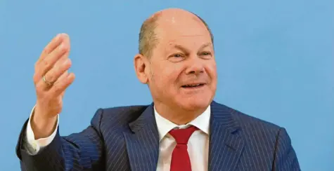  ?? Foto: Annegret Hilse, dpa ?? Bundesfina­nzminister Olaf Scholz: „Jetzt wird wieder in die Hände gespuckt, wir steigern das Bruttosozi­alprodukt.“