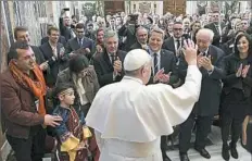  ?? L’Osservator­e Romano/Pool Photo via AP ?? At the Vatican on Monday, Pope Francis meets a delegation of politician­s from the town of Marseilles, France.