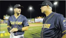  ??  ?? Tim Tebow and Eastern Division manager Jay Bell at the Eastern League All-star game in Trenton, N.J.