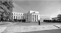  ?? — Reuters photo ?? The US Federal Reserve is poised to raise its benchmark interest rate amid burgeoning job growth and a surge of market optimism since President Donald Trump took office.