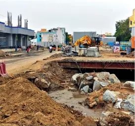  ?? ?? A stretch of Tiruvottiy­ur High Road at Tondiarpet that has been closed for five years