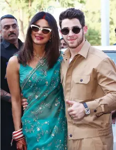  ?? GETTY IMAGES ?? Priyanka Chopra and Nick Jonas, who wed during two extravagan­t ceremonies in India over the weekend, have drawn ire from PETA.